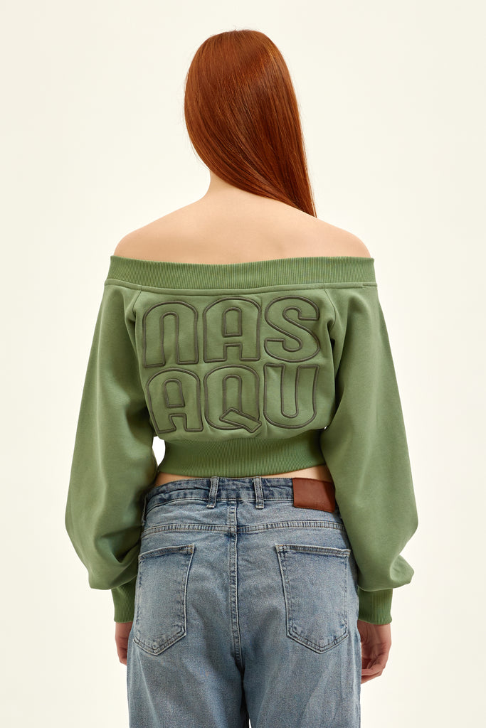 back of an amazing off shoulder green top with embroidery design