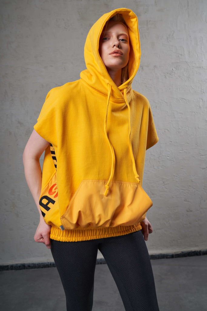 yellow sleeveless hoodie top with amazing embroidery 