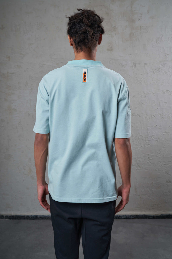 back of an ethically made mint 100% cotton t-shirt
