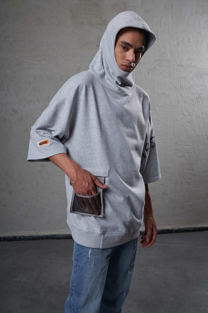 young man with short sleeve eco friendly grey hoodie with detachable wallet pocket