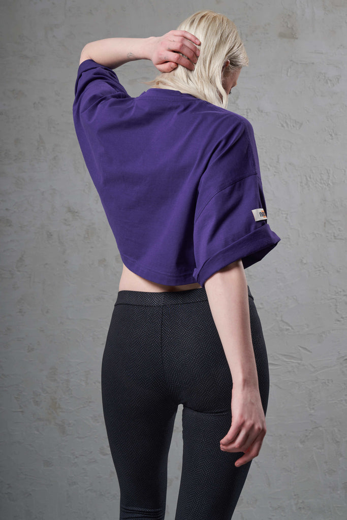 back of a sustainable purple crop tee top 
