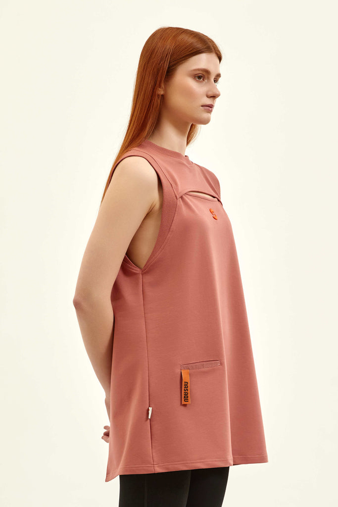 side of a sleeveless women top with a micro pocket and an embroidery  